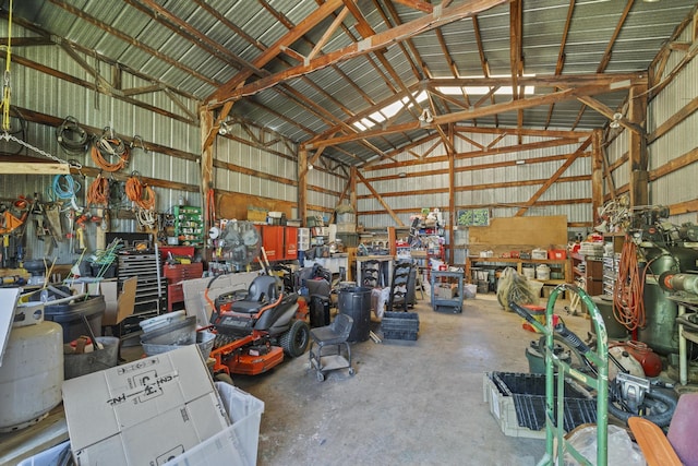 5680 N Farm Rd Unit 215, Strafford, MO 65757 - garage featuring a workshop area and metal wall