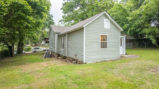 222 Poplar St, Thayer, MO 65791 - view of side of home with central air condition unit and roof with shingles