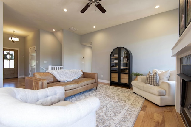 622 N Rockingham Ave, Nixa, MO 65714 - living area featuring light wood-style flooring, a ceiling fan, recessed lighting, and baseboards
