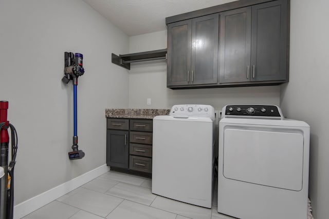 622 N Rockingham Ave, Nixa, MO 65714 - laundry area featuring cabinet space, washer and dryer, and baseboards