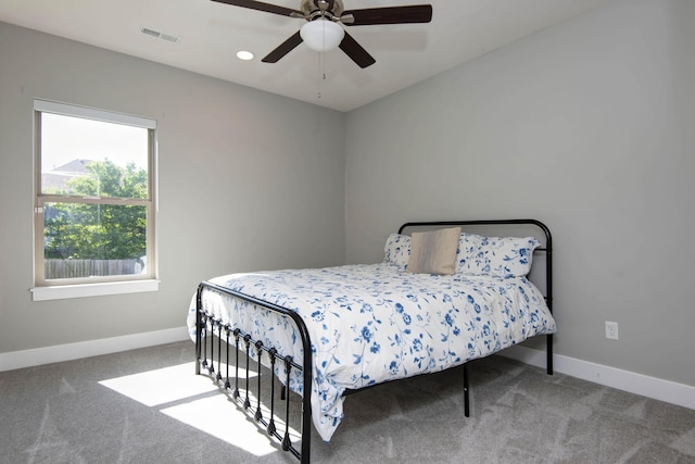622 N Rockingham Ave, Nixa, MO 65714 - carpeted bedroom with baseboards and a ceiling fan