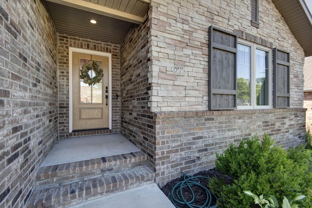 622 N Rockingham Ave, Nixa, MO 65714 - property entrance featuring brick siding