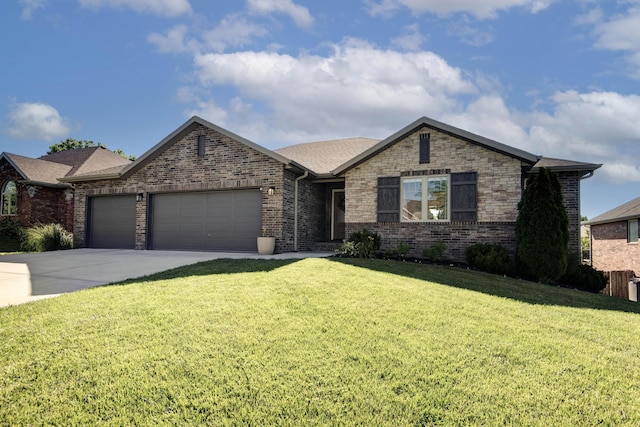 622 N Rockingham Ave, Nixa, MO 65714 - view of front facade with an attached garage, a front lawn, and brick siding