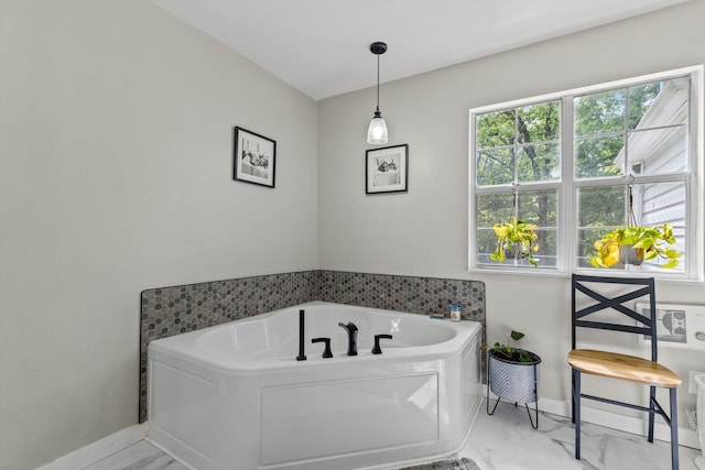 2952 Clearview Dr, Mansfield, MO 65704 - bathroom featuring a bath, marble finish floors, and baseboards