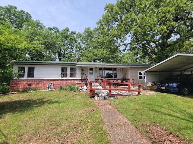 8385 Sate Highway 5, Gainesville, MO 65655 - single story home with a front yard, brick siding, and a carport