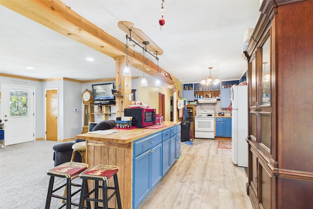 8385 Sate Highway 5, Gainesville, MO 65655 - kitchen with white appliances, blue cabinets, wooden counters, a chandelier, and a breakfast bar area