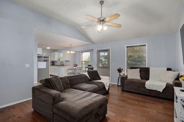 1141 N Hilton Ave, Springfield, MO 65803 - living room featuring lofted ceiling, plenty of natural light, dark wood-type flooring, a ceiling fan, and baseboards