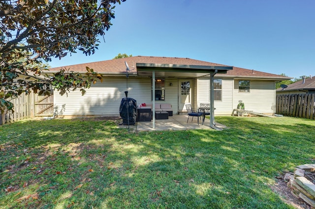 1141 N Hilton Ave, Springfield, MO 65803 - back of house with a patio area and an outdoor hangout area