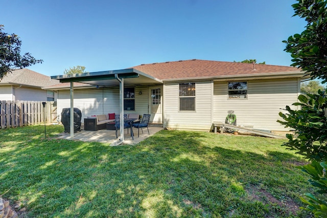 1141 N Hilton Ave, Springfield, MO 65803 - rear view of house with a patio and an outdoor living space