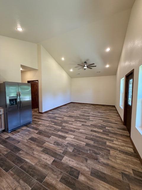 429 E S St, Mountain Grove, MO 65711 - unfurnished living room with dark wood finished floors, a ceiling fan, recessed lighting, and high vaulted ceiling