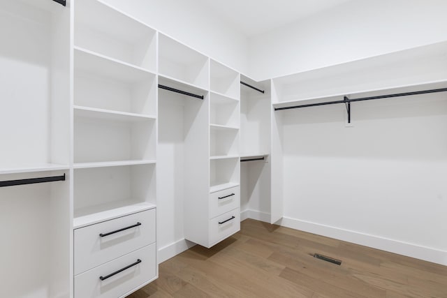 1702 E Cobblestone Dr, Ozark, MO 65721 - spacious closet featuring wood finished floors