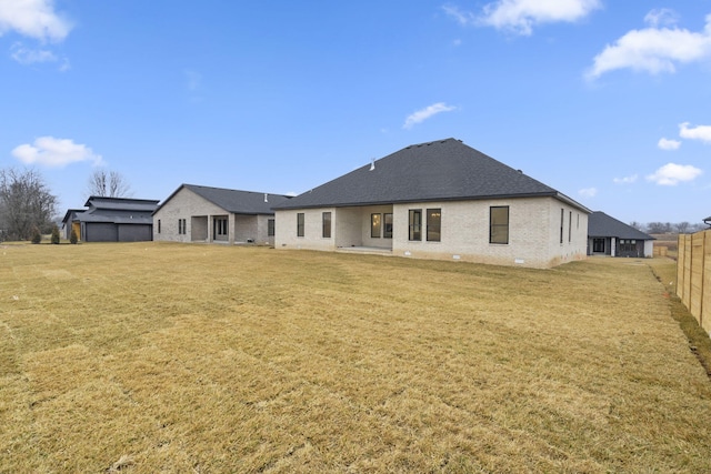 1702 E Cobblestone Dr, Ozark, MO 65721 - rear view of property with brick siding