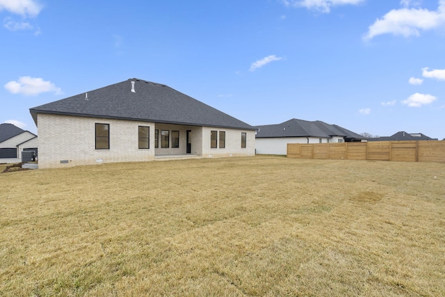 1702 E Cobblestone Dr, Ozark, MO 65721 - back of property with a shingled roof and brick siding