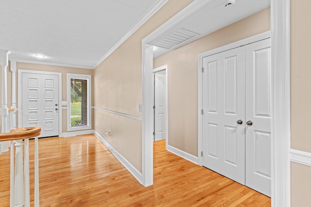 8205 Quail Ridge Ct, Nixa, MO 65714 - entrance foyer featuring crown molding, light wood-style flooring, and baseboards