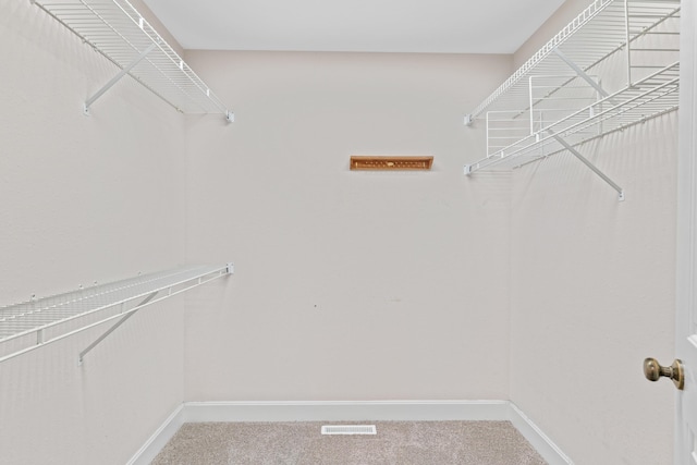8205 Quail Ridge Ct, Nixa, MO 65714 - spacious closet with carpet flooring