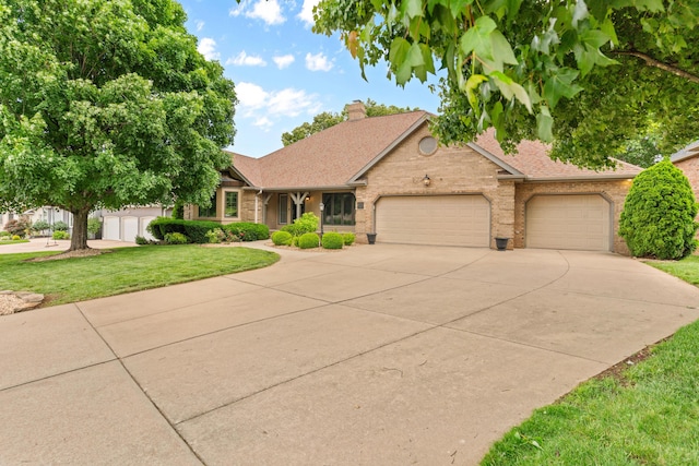 8205 Quail Ridge Ct, Nixa, MO 65714 - view of front of home with a garage, brick siding, driveway, a front lawn, and roof with shingles