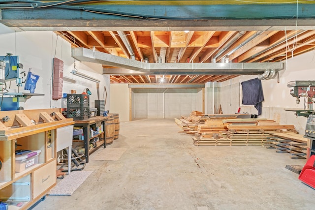 8205 Quail Ridge Ct, Nixa, MO 65714 - unfinished below grade area with a workshop area