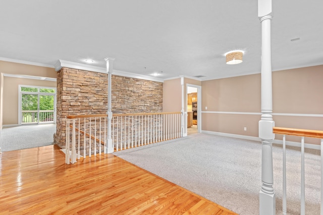 8205 Quail Ridge Ct, Nixa, MO 65714 - empty room featuring crown molding, baseboards, wood finished floors, carpet, and recessed lighting