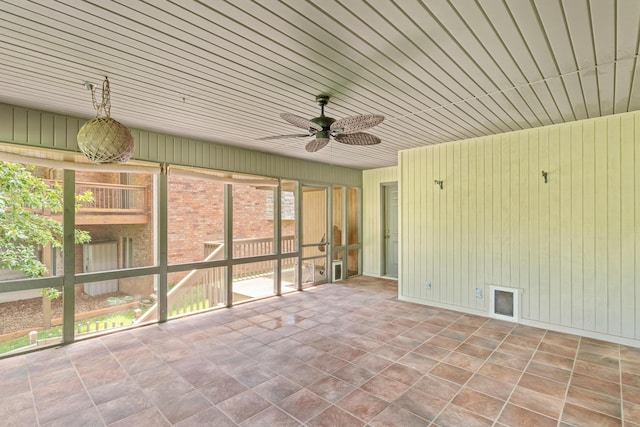 8205 Quail Ridge Ct, Nixa, MO 65714 - unfurnished sunroom with a ceiling fan