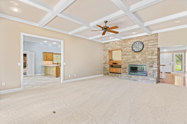 8205 Quail Ridge Ct, Nixa, MO 65714 - unfurnished living room with coffered ceiling, light colored carpet, ceiling fan, baseboards, and a fireplace