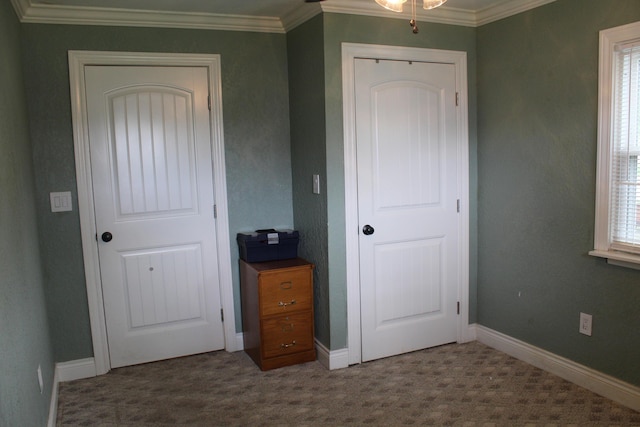 1012 E 3rd St, Monett, MO 65708 - carpeted bedroom featuring crown molding and baseboards