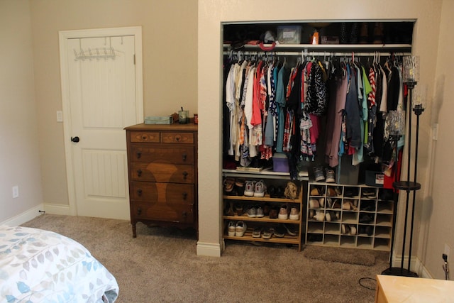 1012 E 3rd St, Monett, MO 65708 - carpeted bedroom with a closet and baseboards