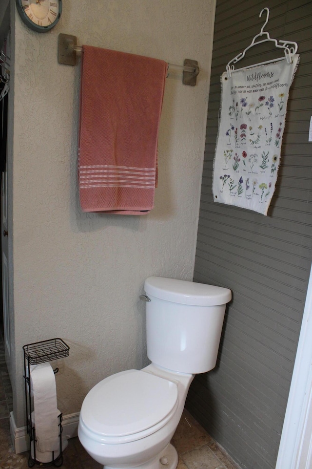 1012 E 3rd St, Monett, MO 65708 - bathroom featuring toilet and a shower with shower curtain