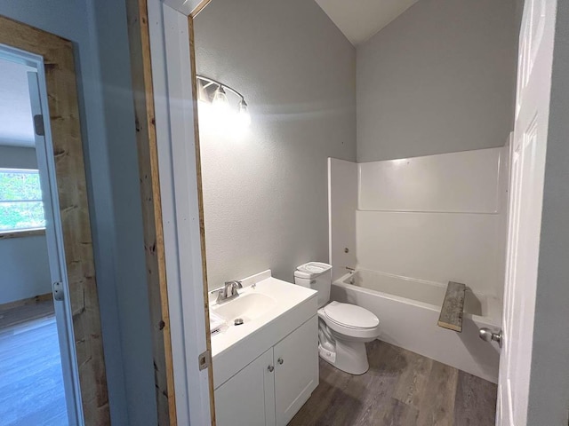 000 Reid Dr, Theodosia, MO 65761 - bathroom with wood finished floors, toilet, vanity, and a tub