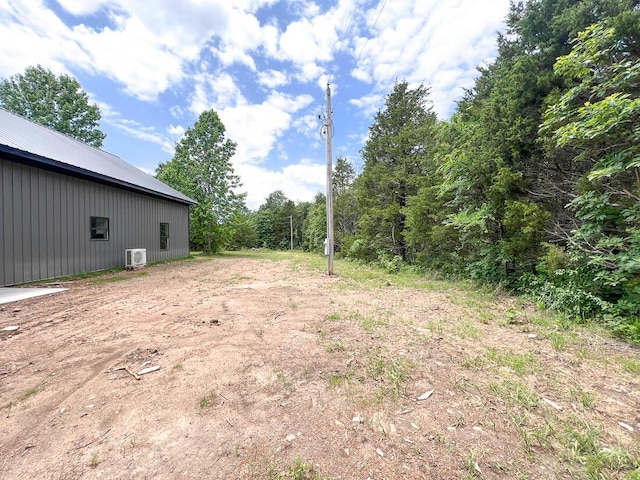 000 Reid Dr, Theodosia, MO 65761 - view of yard with a pole building, an outdoor structure, and ac unit
