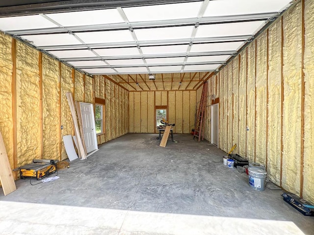 000 Reid Dr, Theodosia, MO 65761 - garage featuring a garage door opener
