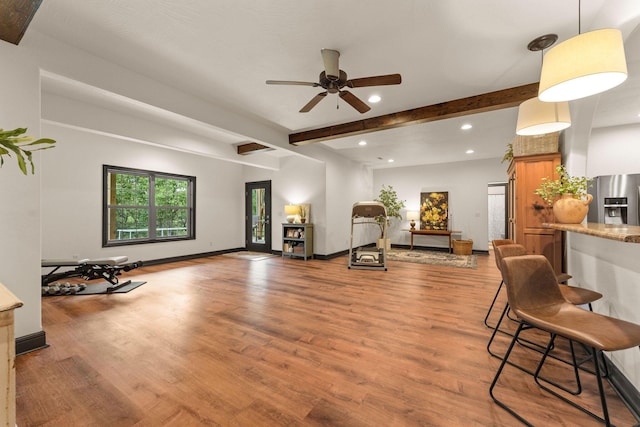 245 William Pl, Branson, MO 65616 - living room featuring beamed ceiling, a ceiling fan, recessed lighting, wood finished floors, and baseboards