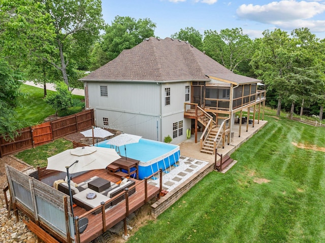 245 William Pl, Branson, MO 65616 - rear view of house featuring a sunroom, roof with shingles, a wooden deck, a patio, and stairs