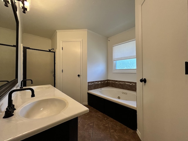 3223 W Primrose St, Springfield, MO 65807 - full bathroom featuring a tub with jets, double vanity, tile patterned flooring, and a shower with door