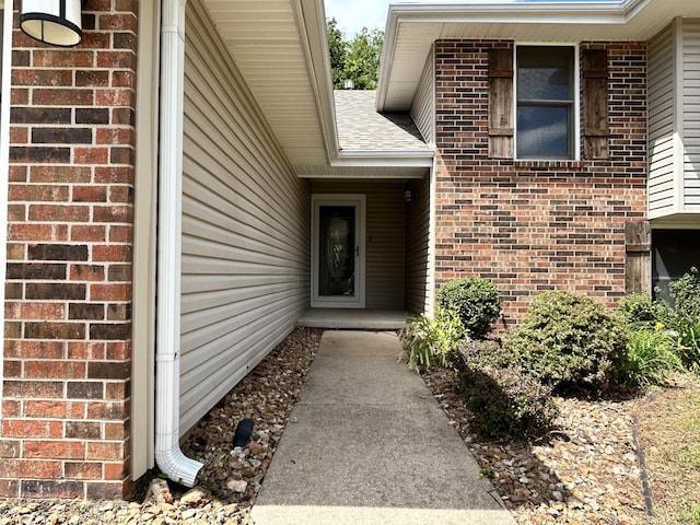 3223 W Primrose St, Springfield, MO 65807 - doorway to property featuring brick siding