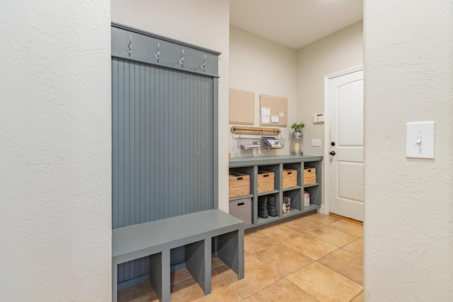 853 E Grafton Dr, Nixa, MO 65714 - mudroom with a textured wall and light tile patterned floors
