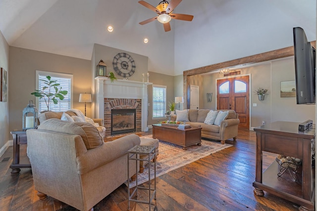 853 E Grafton Dr, Nixa, MO 65714 - living area with wood-type flooring, ceiling fan, high vaulted ceiling, a fireplace, and baseboards
