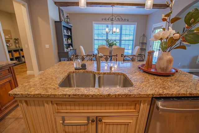 853 E Grafton Dr, Nixa, MO 65714 - kitchen with stainless steel dishwasher, a chandelier, pendant lighting, and light stone counters