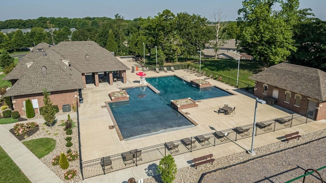 853 E Grafton Dr, Nixa, MO 65714 - community pool with a patio area and an outbuilding