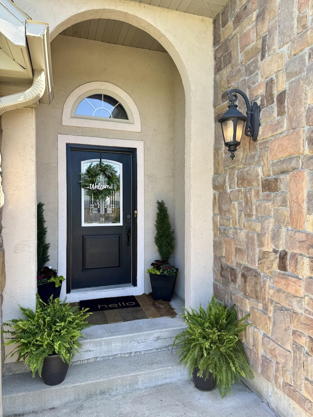 1415 Woodland Rd, Marshfield, MO 65706 - property entrance with stucco siding and stone siding