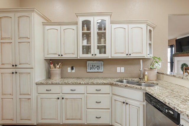 1415 Woodland Rd, Marshfield, MO 65706 - kitchen with dishwasher, a sink, cream cabinets, glass insert cabinets, and light stone countertops