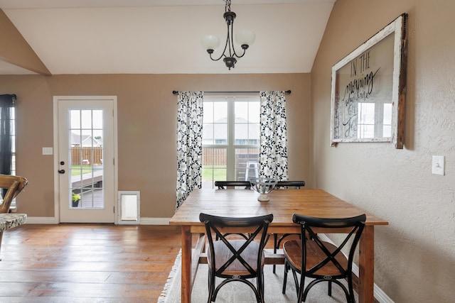 1415 Woodland Rd, Marshfield, MO 65706 - dining area featuring plenty of natural light, hardwood / wood-style flooring, baseboards, and a textured wall