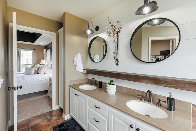 1415 Woodland Rd, Marshfield, MO 65706 - bathroom featuring ensuite bathroom, double vanity, and tile patterned floors