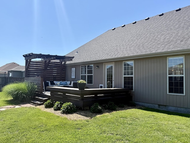 1415 Woodland Rd, Marshfield, MO 65706 - rear view of house with a pergola, a deck, a shingled roof, and outdoor lounge area