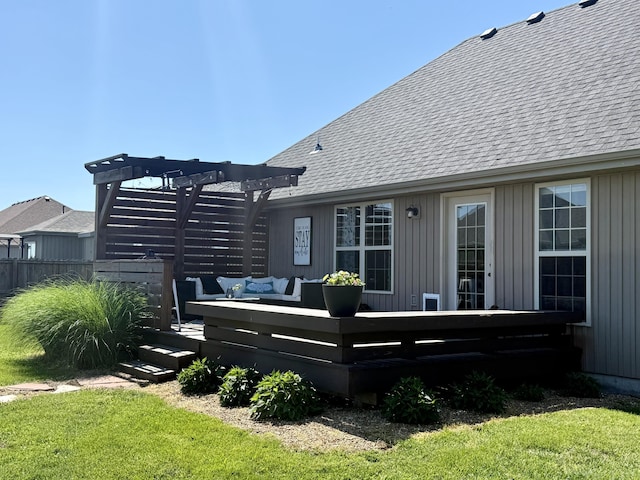 1415 Woodland Rd, Marshfield, MO 65706 - rear view of property with a deck, a pergola, a shingled roof, and board and batten siding