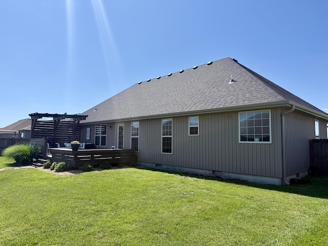 1415 Woodland Rd, Marshfield, MO 65706 - rear view of house featuring roof with shingles, a yard, a pergola, and a deck