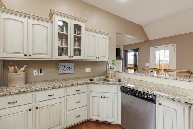 1415 Woodland Rd, Marshfield, MO 65706 - kitchen featuring dishwasher, a sink, lofted ceiling, glass insert cabinets, and cream cabinets