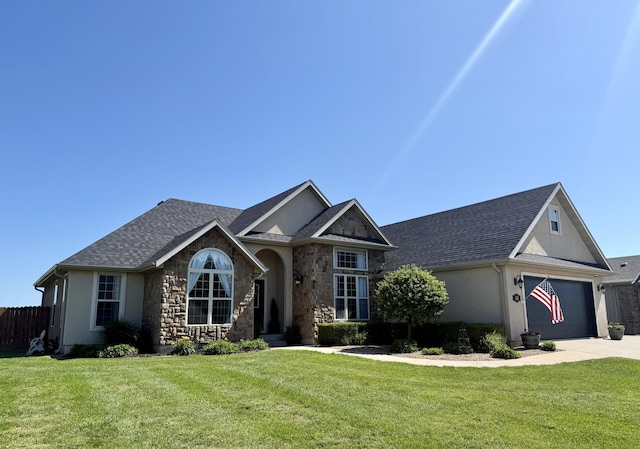 1415 Woodland Rd, Marshfield, MO 65706 - view of front facade with stucco siding, concrete driveway, stone siding, and an attached garage