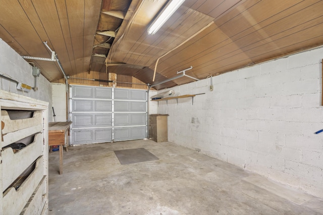 300 S High Ave, Ash Grove, MO 65604 - garage featuring concrete block wall