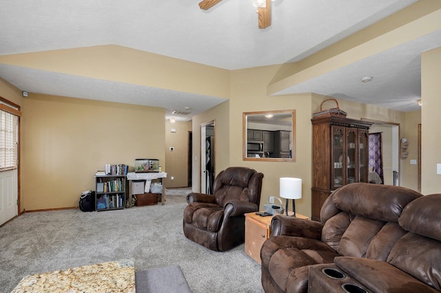 413 W Chestnut Rd, Nixa, MO 65714 - living room featuring carpet floors, a ceiling fan, and baseboards