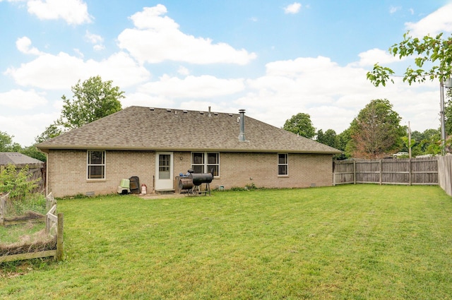 413 W Chestnut Rd, Nixa, MO 65714 - back of property with brick siding and roof with shingles